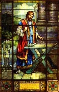 Vitro de masón calculando sobre mesa